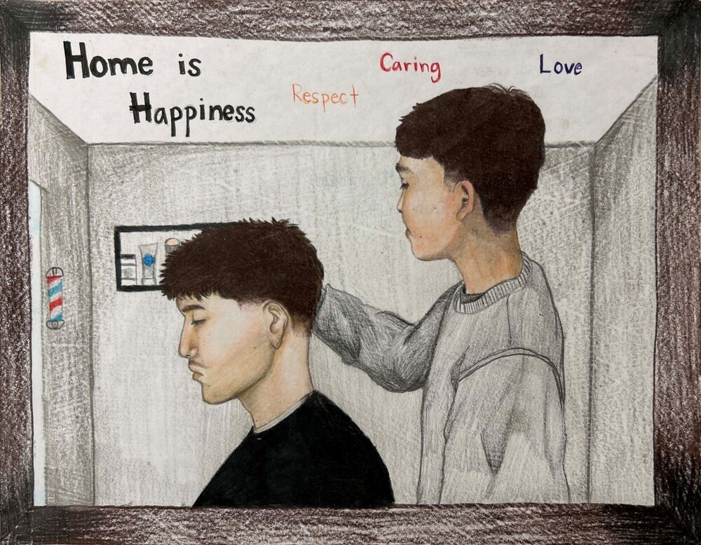 2026 What Home Means to me winner. A barber cutting another mans hair in a barber shop. Home is Respect. Caring. Love.